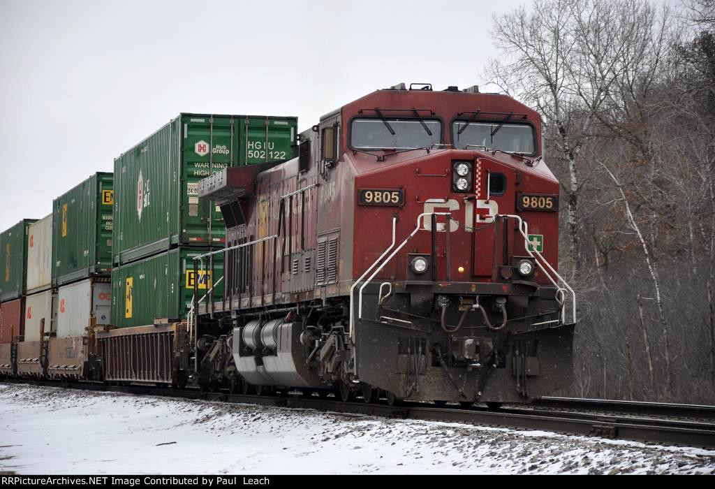 Tied down westbound intermodal waits in the siding